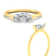 horizontal-marquise-diamond-engagement-ring-solitaire-in-yellow-gold-fdenr11731mqangle3-nl-yg.jpg?v=1775632286